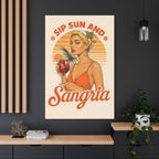 Poster of a woman holding a sangria glass with text 'Sip Sun And Sangria' on a wall.