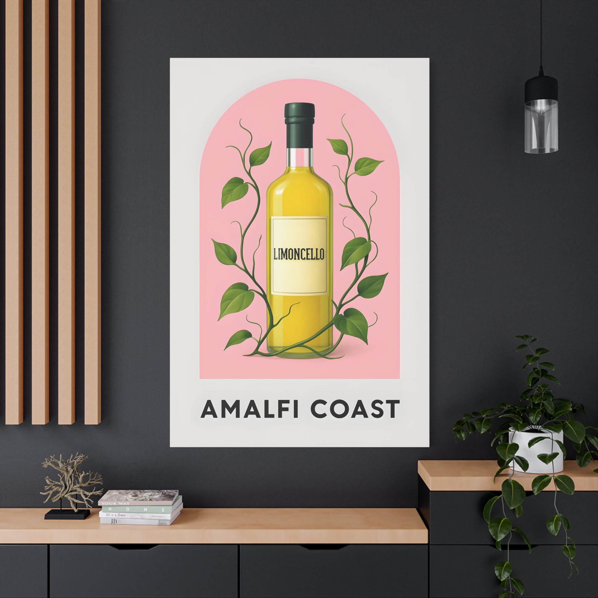 Poster of a limoncello bottle with leaves on a pink background, titled 'Amalfi Coast', in a modern interior setting.